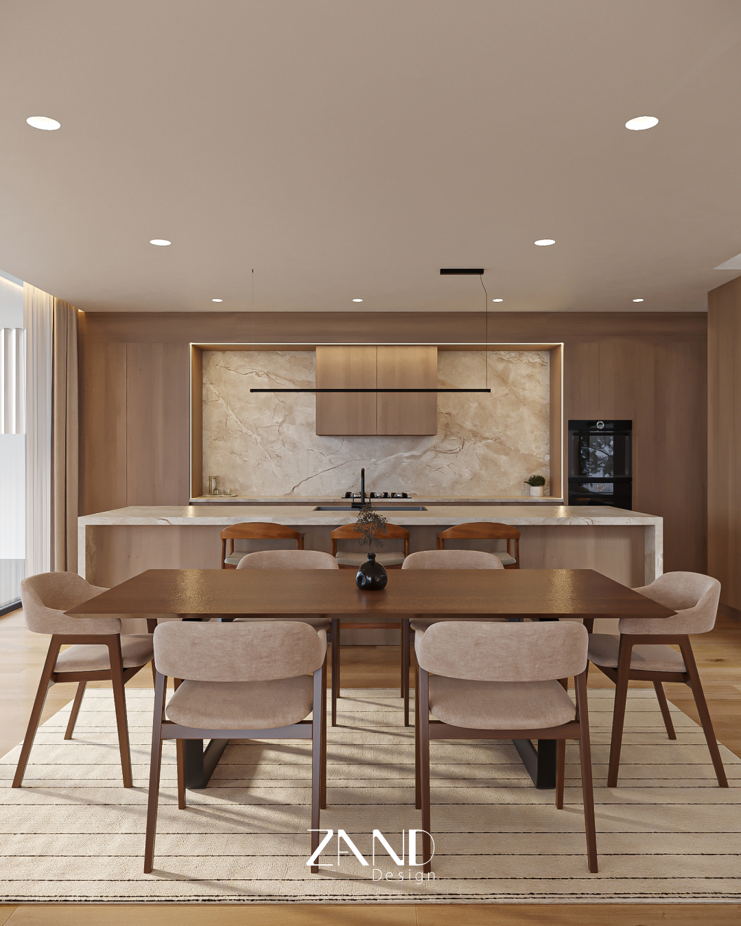 A symmetrical view of a modern dining area and kitchen. A dark wood dining table with six beige chairs sits on a striped rug in the foreground, leading to a marble kitchen island and wood-paneled cabinetry.