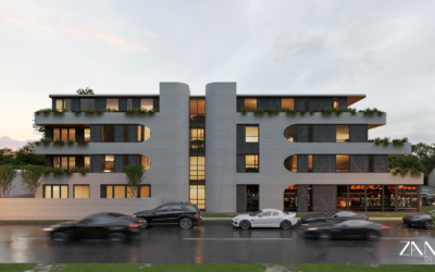 A wide side-elevation shot showing the full length of the contemporary apartment complex. The building's symmetry is anchored by two curved vertical brick pillars in the center. The facade features a rhythmic pattern of arched balconies filled with vegetation, while several dark SUVs and sedans appear in motion on the wet asphalt road in the foreground.