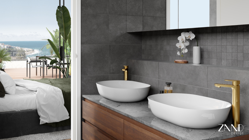 An interior perspective from a dark-tiled bathroom looking into an adjacent bedroom. The bedroom features a bed with white and forest-green linens, leading directly out to a sunlit balcony with views of the sea.