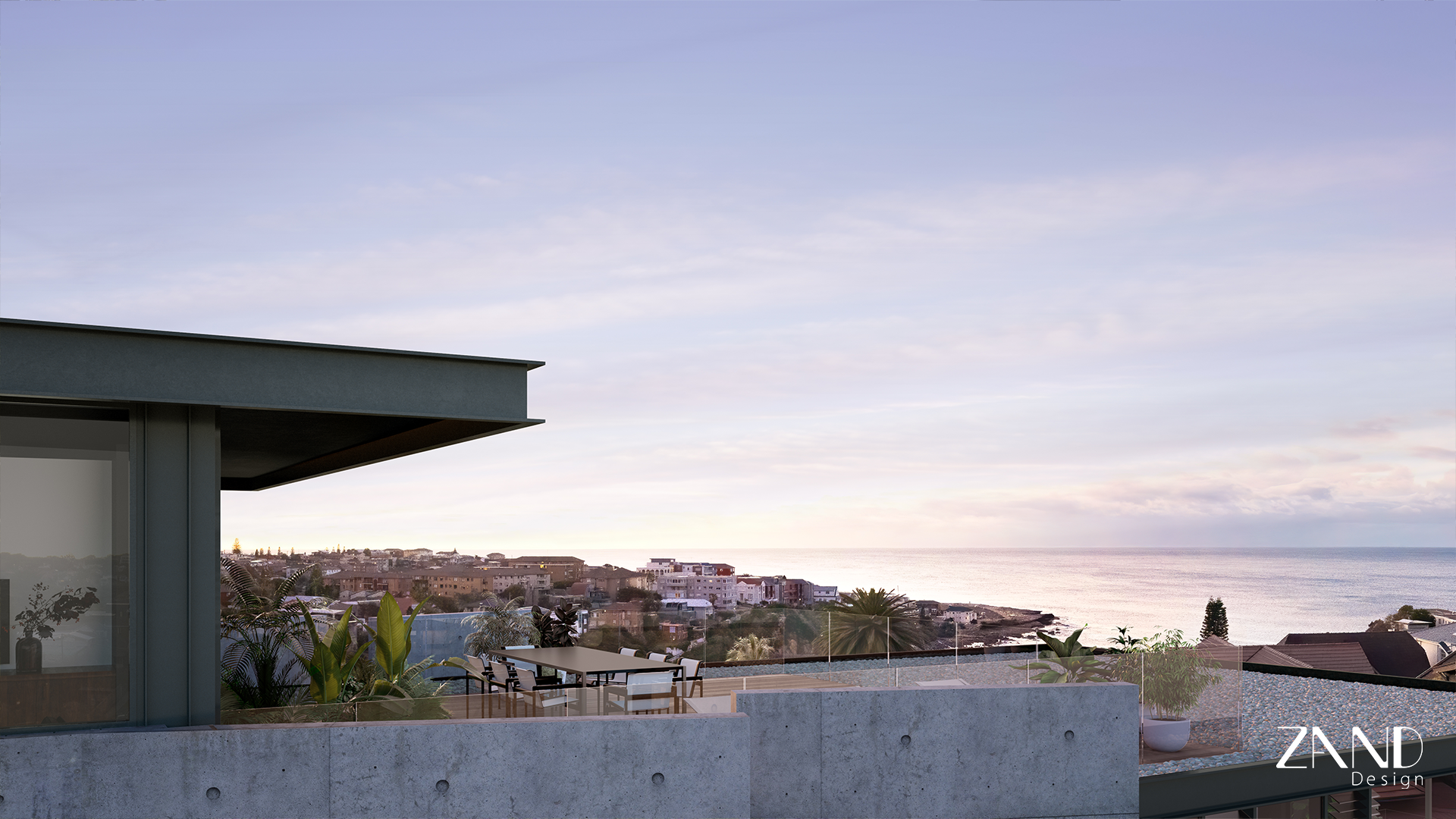 A wide-angle view of a rooftop terrace at dusk, featuring raw concrete walls, glass railings, and an outdoor dining set. The background offers a sweeping elevated view of the Randwick neighborhood stretching toward the ocean under a soft twilight sky.
