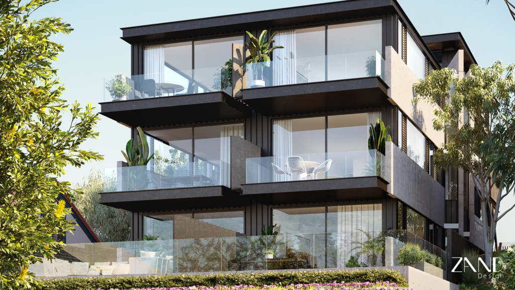 An exterior view of a modern, multi-story residential building featuring dark charcoal metal cladding and expansive glass-fronted balconies. Lush green plants and tropical foliage are integrated into the balcony spaces, set against a clear blue sky.
