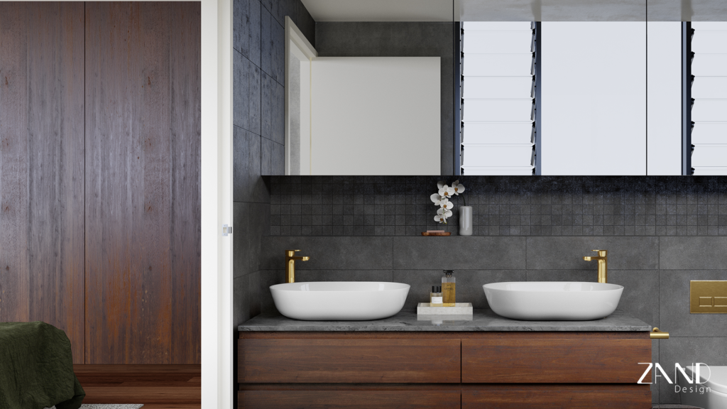 A close-up of a contemporary bathroom featuring a dark timber double vanity with a grey stone countertop and two white oval vessel sinks. The wall is finished with dark grey textured tiles, accented by brushed gold faucets and a minimalist mirror reflecting louvred windows.A close-up of a contemporary bathroom featuring a dark timber double vanity with a grey stone countertop and two white oval vessel sinks. The wall is finished with dark grey textured tiles, accented by brushed gold faucets and a minimalist mirror reflecting louvred windows.